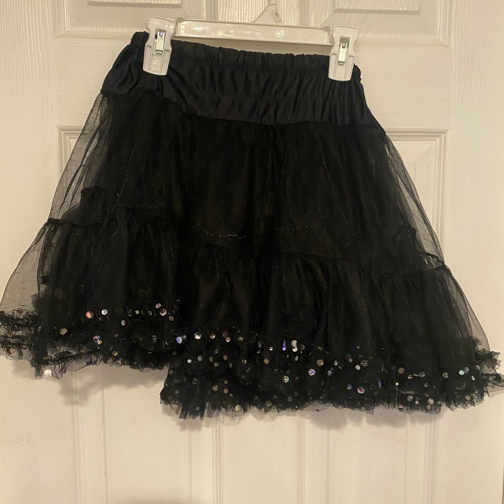Black TuTu skirt with silver sequins on bottom, good for under another skirt